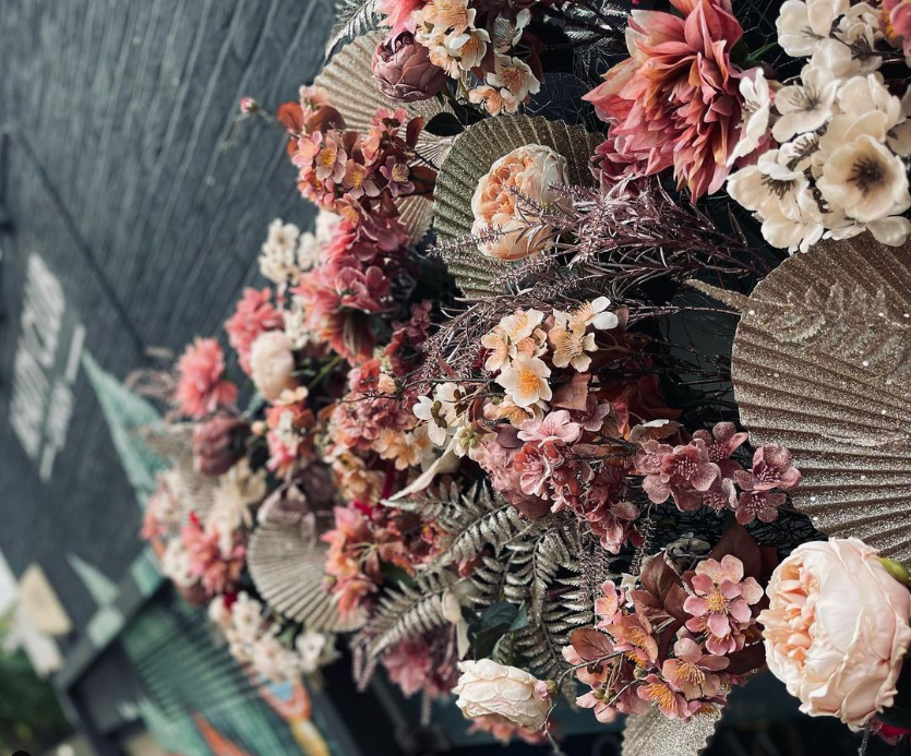 flowers for event in london oxford circus | space NK installation | soft floral tones with pinks and golds