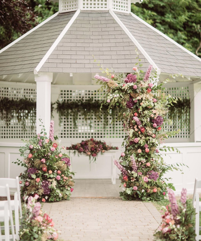 Floral display over an outside canopy