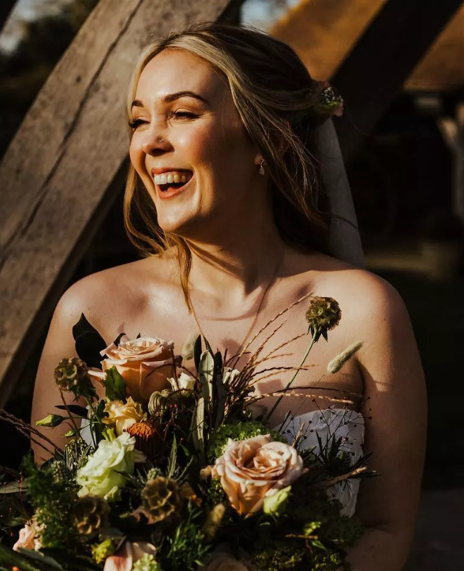 stunning bride with flowers from kent wedding
